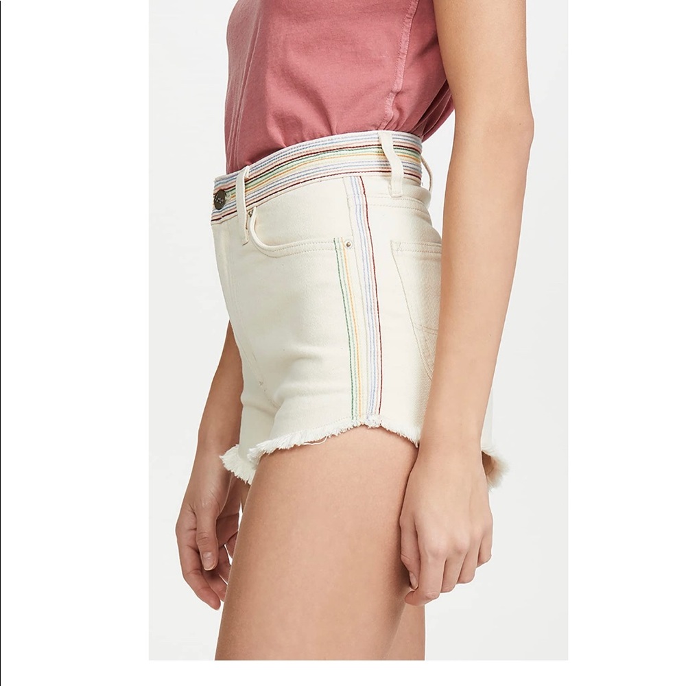 Lee modern vintage off white cutoffs with embroidary detail.